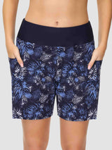 Women's navy quick-dry board shorts, 5" inseam, blue tropical floral print & high waist.