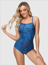 Women's blue one-piece swimsuit with tropical leaf print and adjustable shoulder straps. #color_Blue
