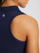 Navy blue women's sleeveless golf polo shirt with racerback detail #color_Navy Blue
