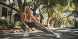Woman wearing high waisted yoga pants stretching outdoors on a fitness trail