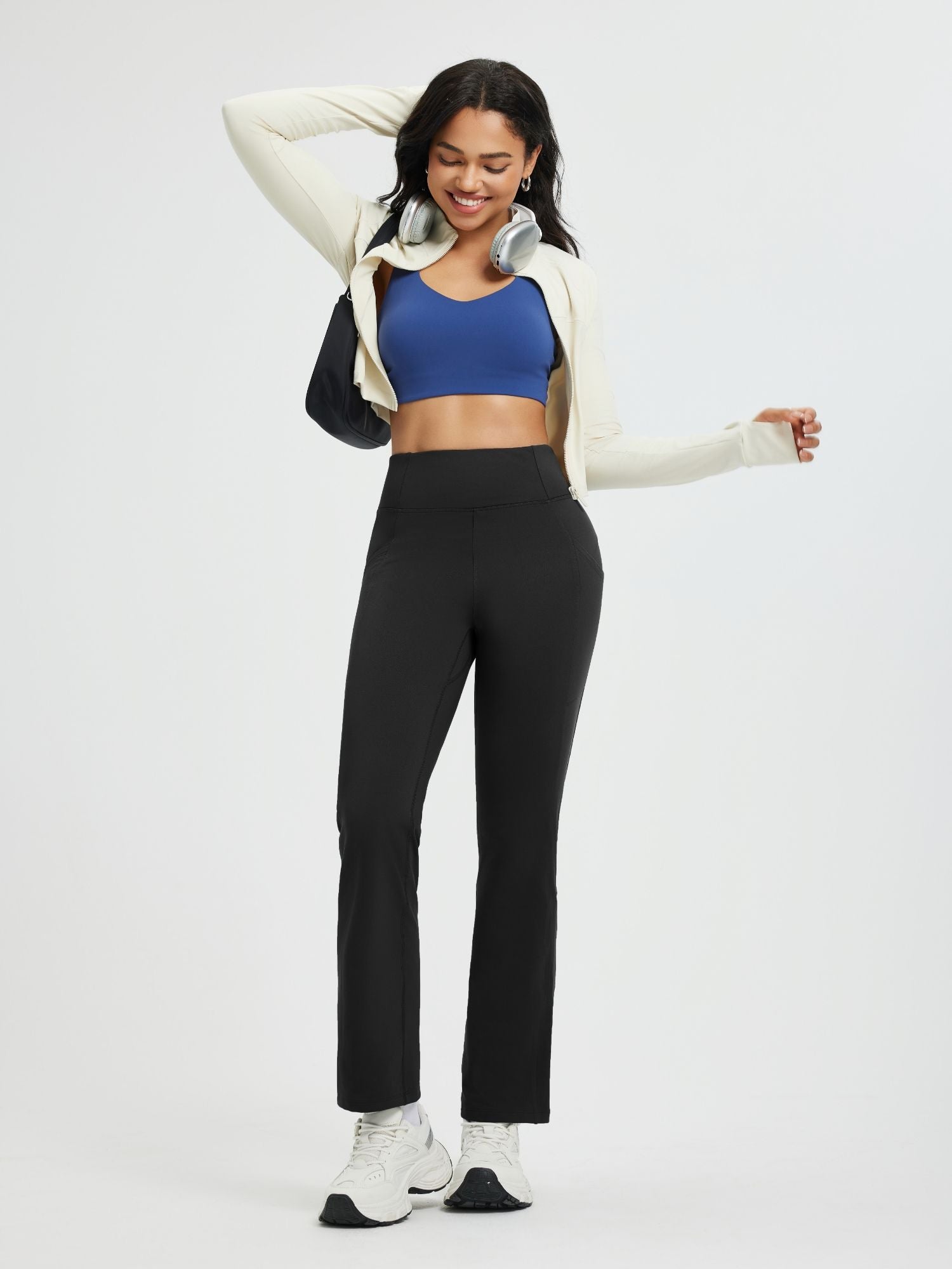Women's black fleece boot-cut pants with high-waist and straight leg. #color_Black