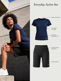 Baleaf women's everyday active set: navy quick-dry t-shirt and black Bermuda shorts with tummy control. 