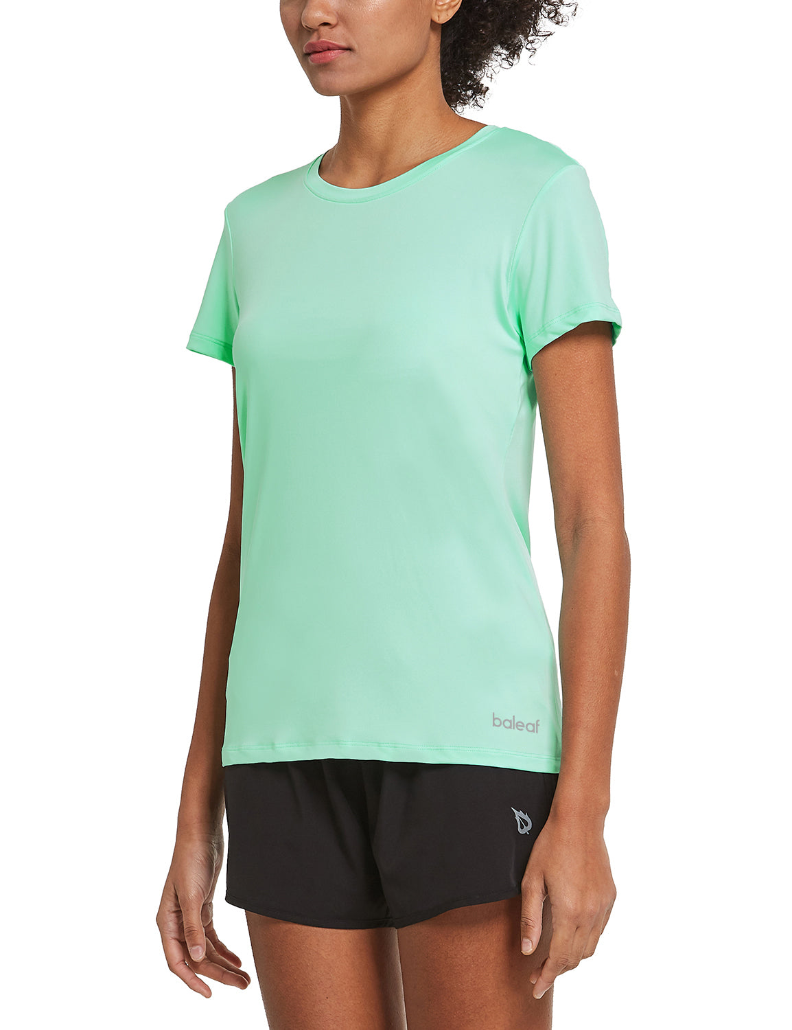 Everyday Active Set: mint green women's running shirt and black shorts.