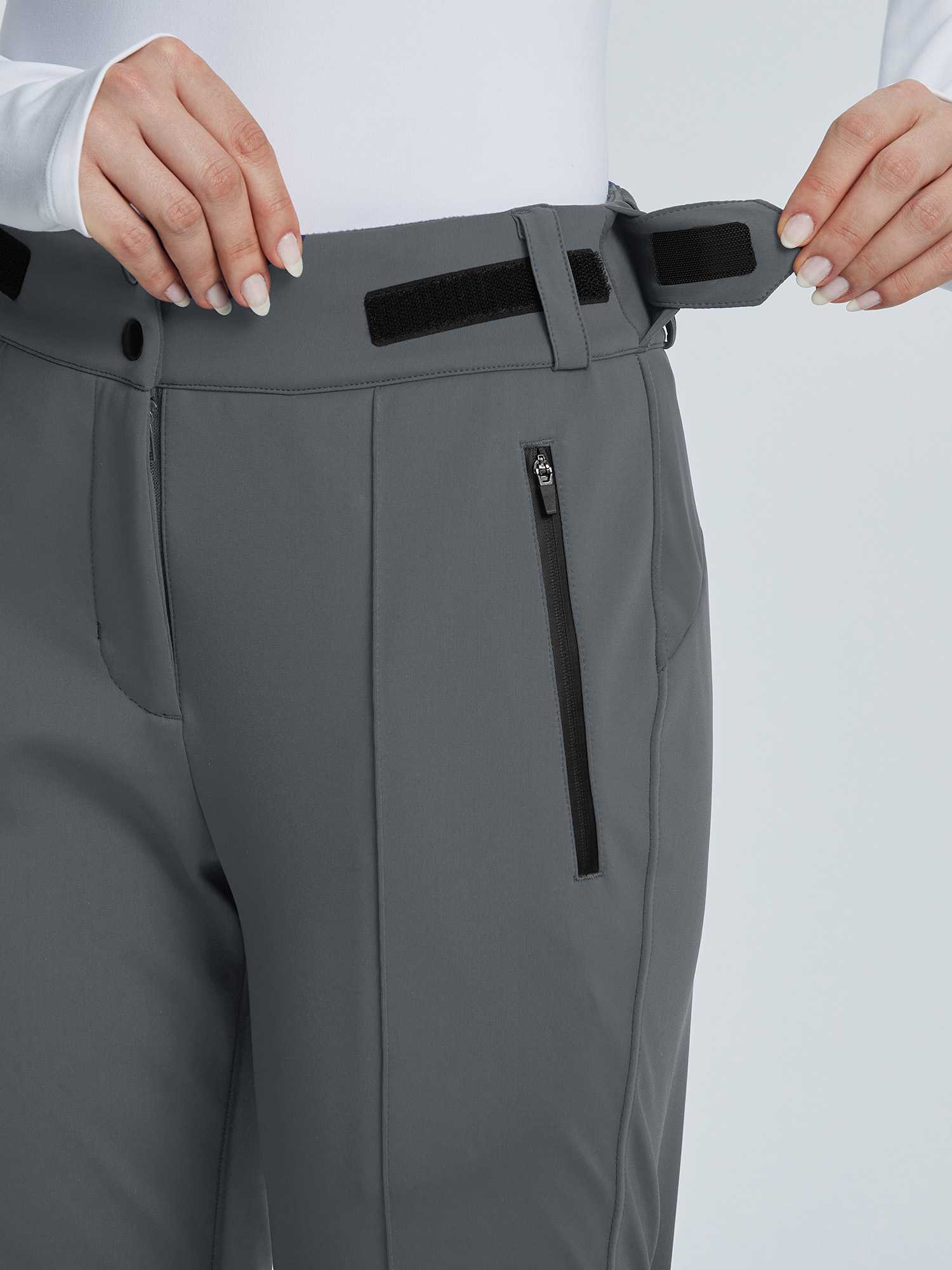 Grey soft-shell ski pants with adjustable velcro waistband and zipper pocket. #color_Dark Gray