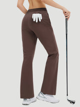 Brown women's flare golf pants, 29" inseam, with glove in back pocket and golf club. #color_Dark Brown
