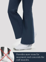 Women's navy 29" flare golf pants with inset graphic on leg movement and calf coverage.