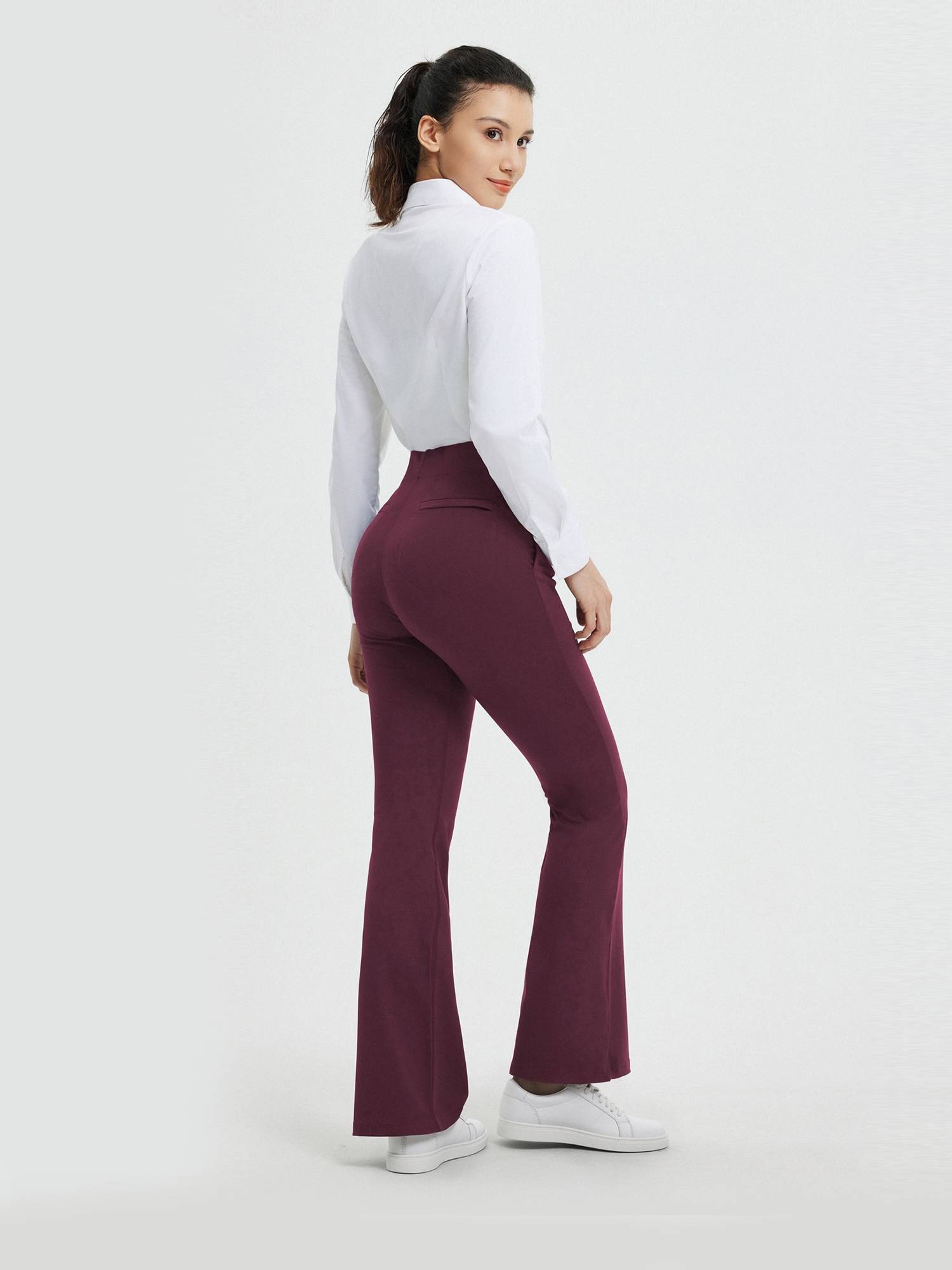 Women's burgundy high-waisted flared yoga business pants with bootcut silhouette. #Color_Wine Red