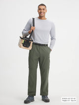 Baleaf olive green 3-in-1 convertible ripstop hiking pants on model, 6'1" M size. #color_Army Green