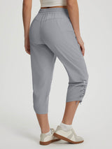 Grey UPF50+ water resistant hiking capris with adjustable ankle and zippered pocket. #color_Light Gray