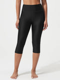 Black 18 inch high rise swim capris with UPF50+ and pockets. #color_Black
