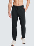 Men's black fleece jogger pants with drawstring, zippered pocket, and reflective accents. #color_Black