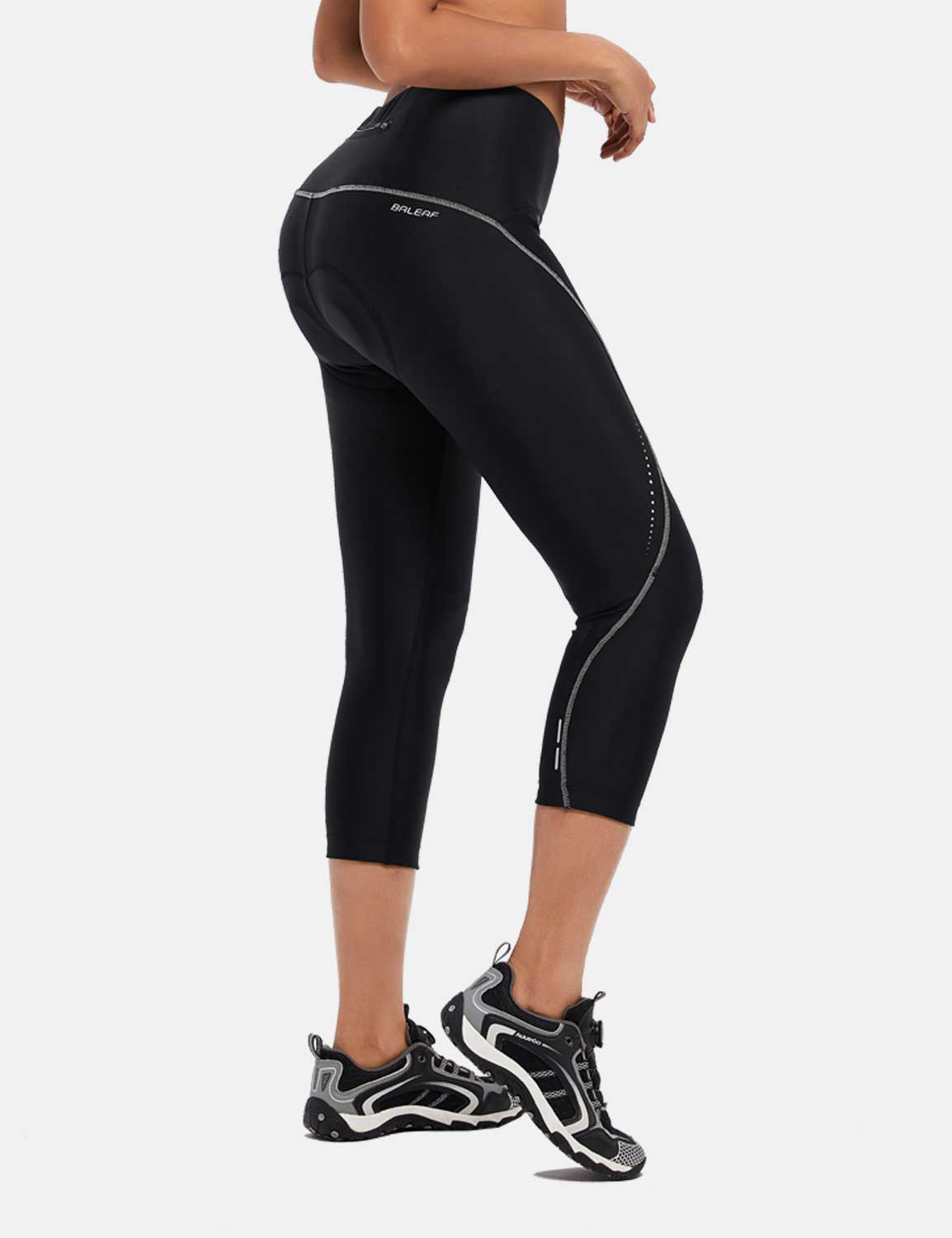 Women's black UPF 50+ padded cycling capris, high-waisted, 3/4 length, reflective trim. #color_Gray