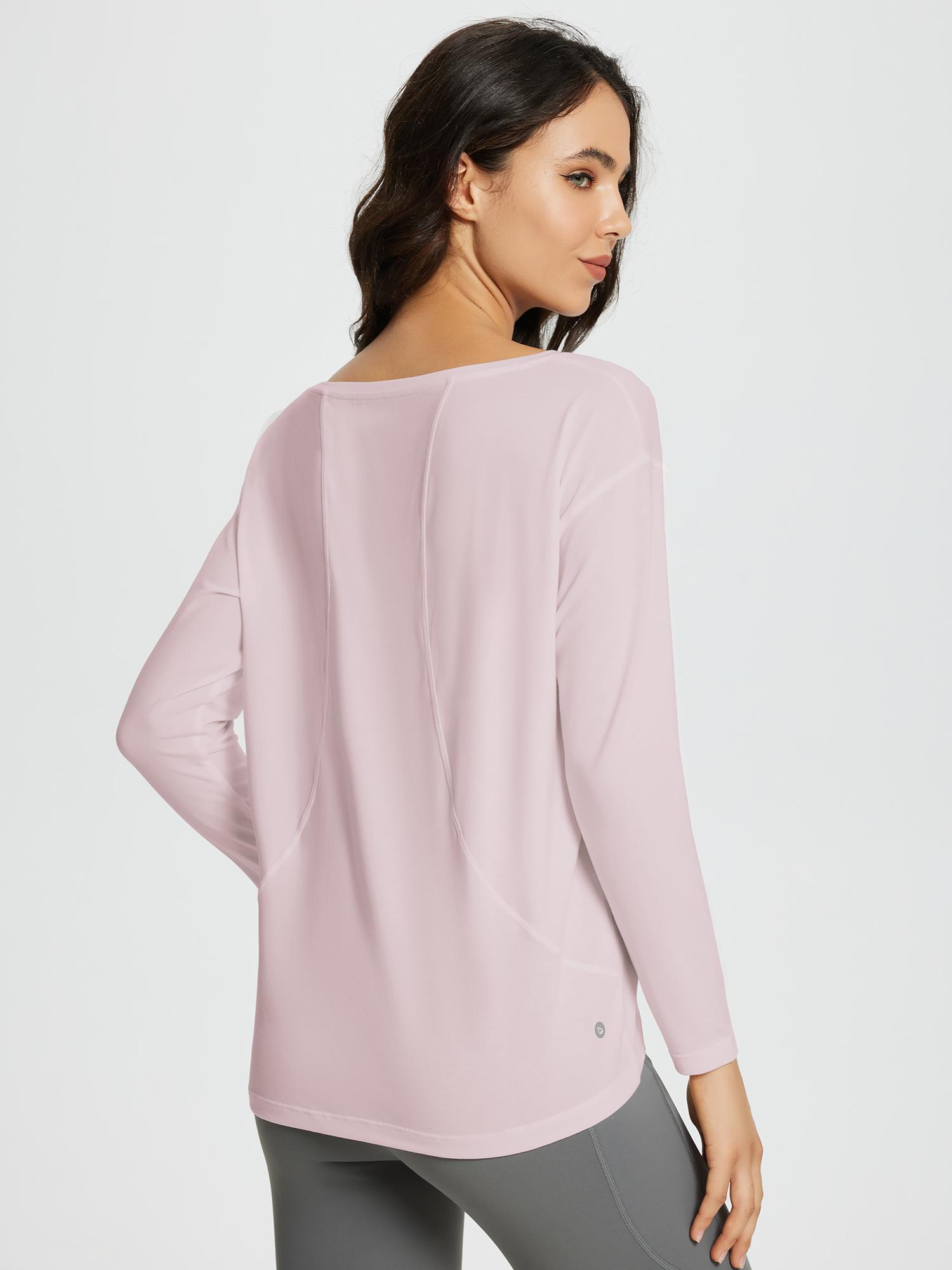 Women's pale pink long-sleeve workout shirt with boat neckline, loose fit, and scoop back hem. #color_Light Purple