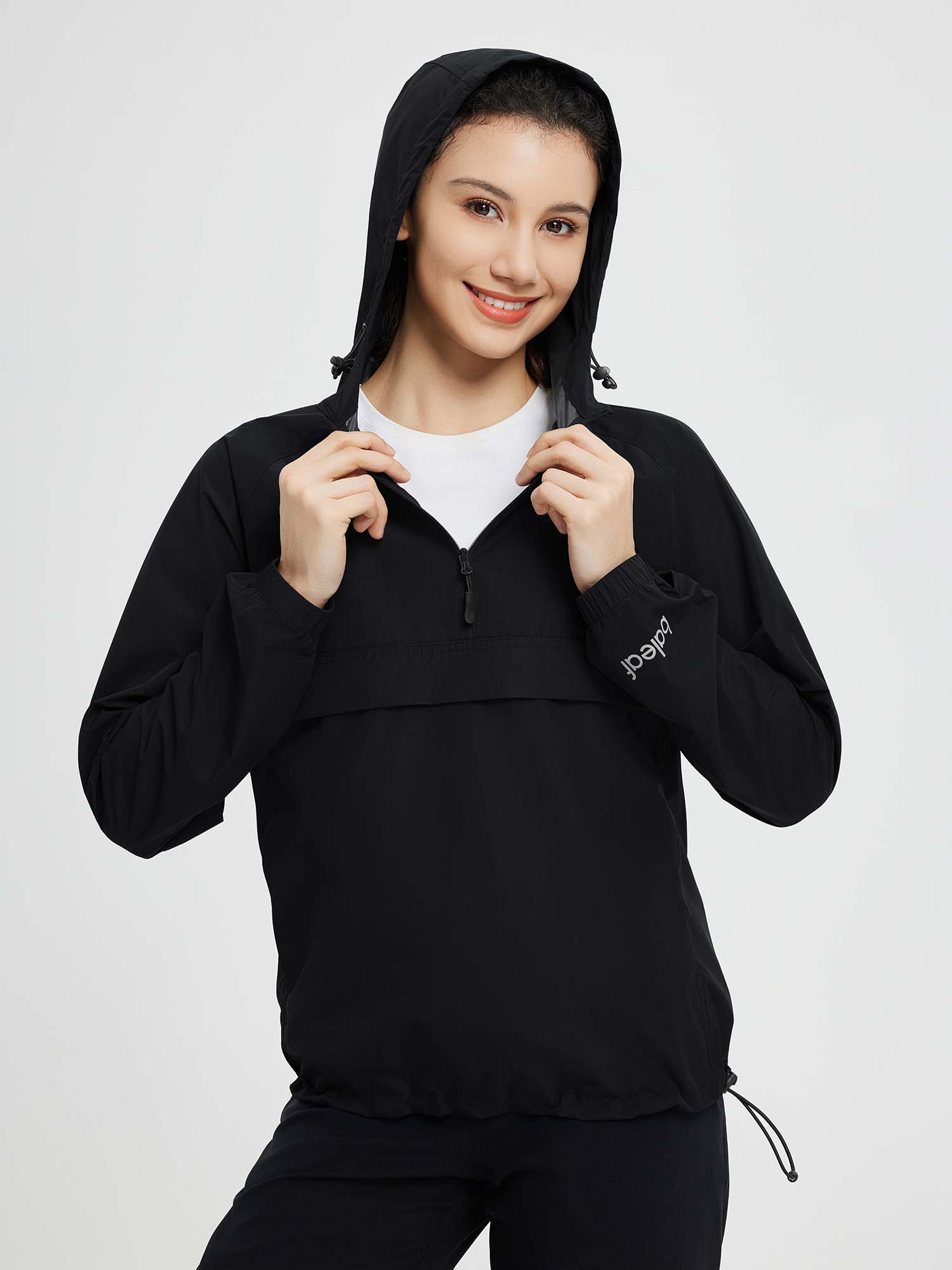 Black Baleaf women's packable 1/4 zip windbreaker jacket with hood #color_Black
