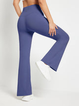 Blue fleece flare pants with high waist, pockets, and V-seam detail.
