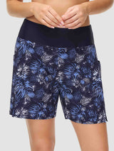 Women's printed quick-dry swim shorts, 5" inseam, navy tropical pattern.
