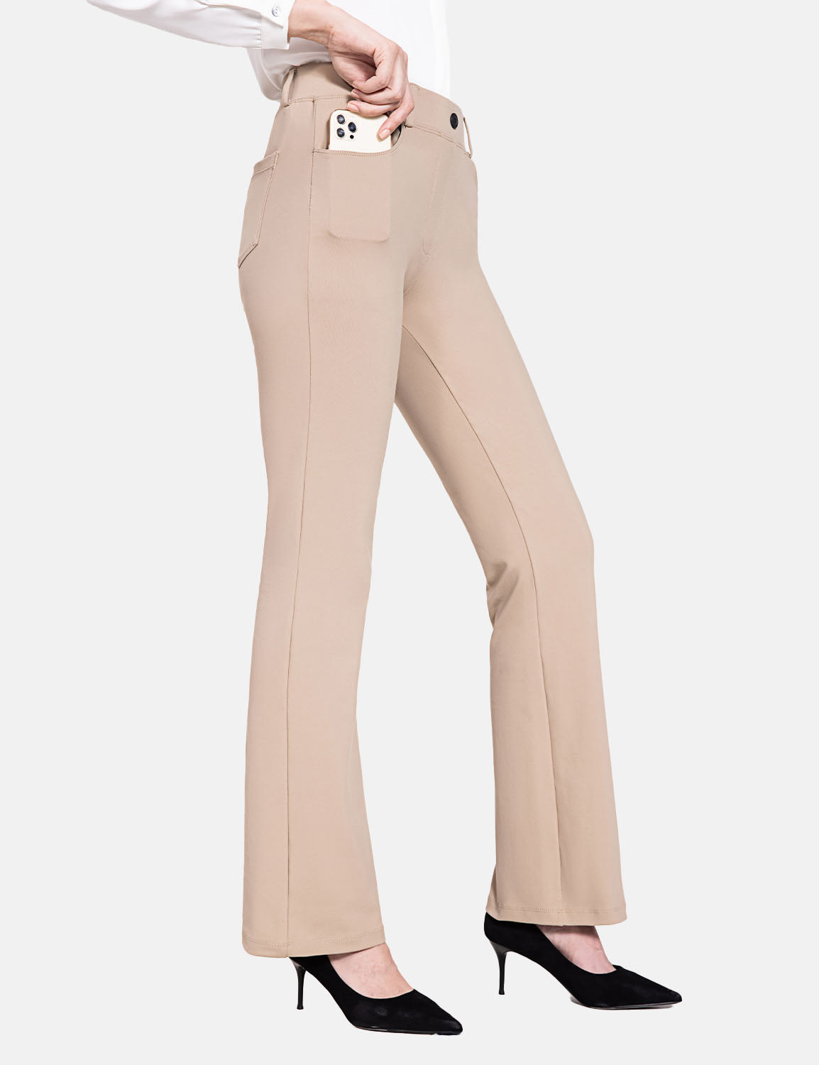 Tan bootcut workleisure pants with a phone in the front pocket, showcasing a flattering fit and mid-rise design.