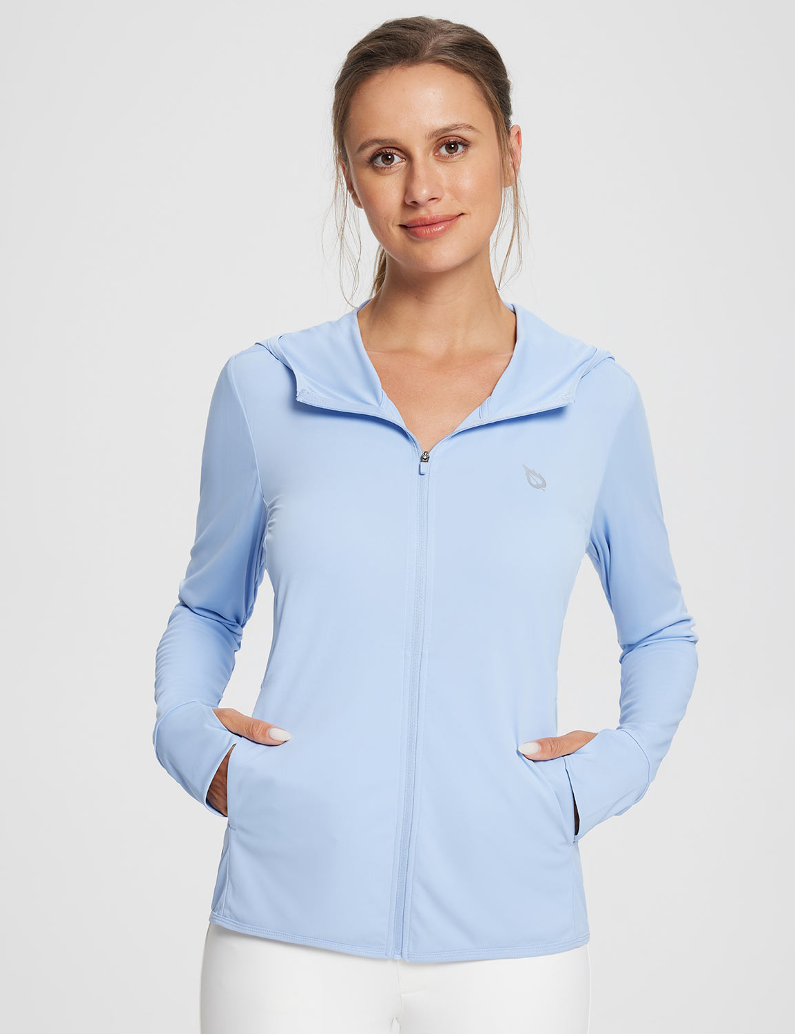 Light blue women's UPF 50+ hooded zip-up jacket with thumbholes & pockets.